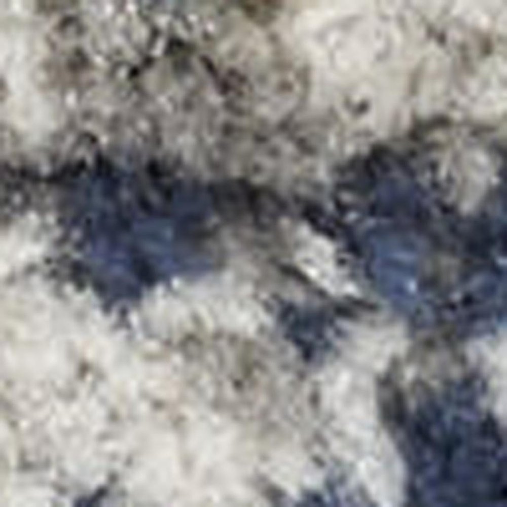 5' X 7' Cream Floral Power Loom Distressed Area Rug
