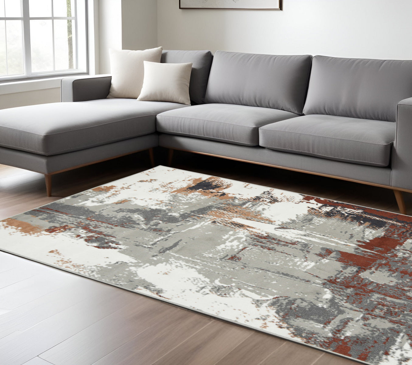 8' Ivory Gray and Rust Abstract Power Loom Round Rug