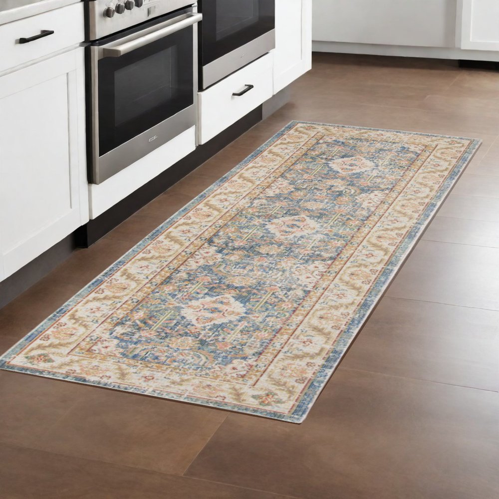 9' X 13' Coral And Blue Floral Area Rug