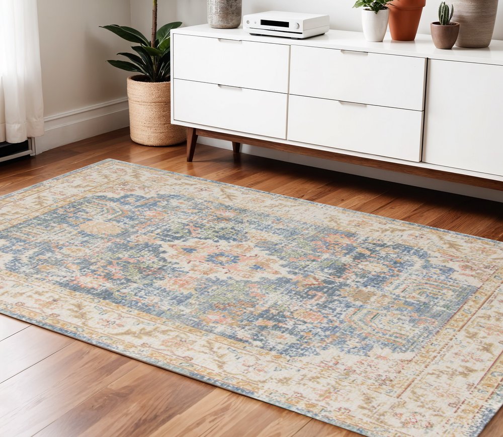 9' X 13' Coral And Blue Floral Area Rug