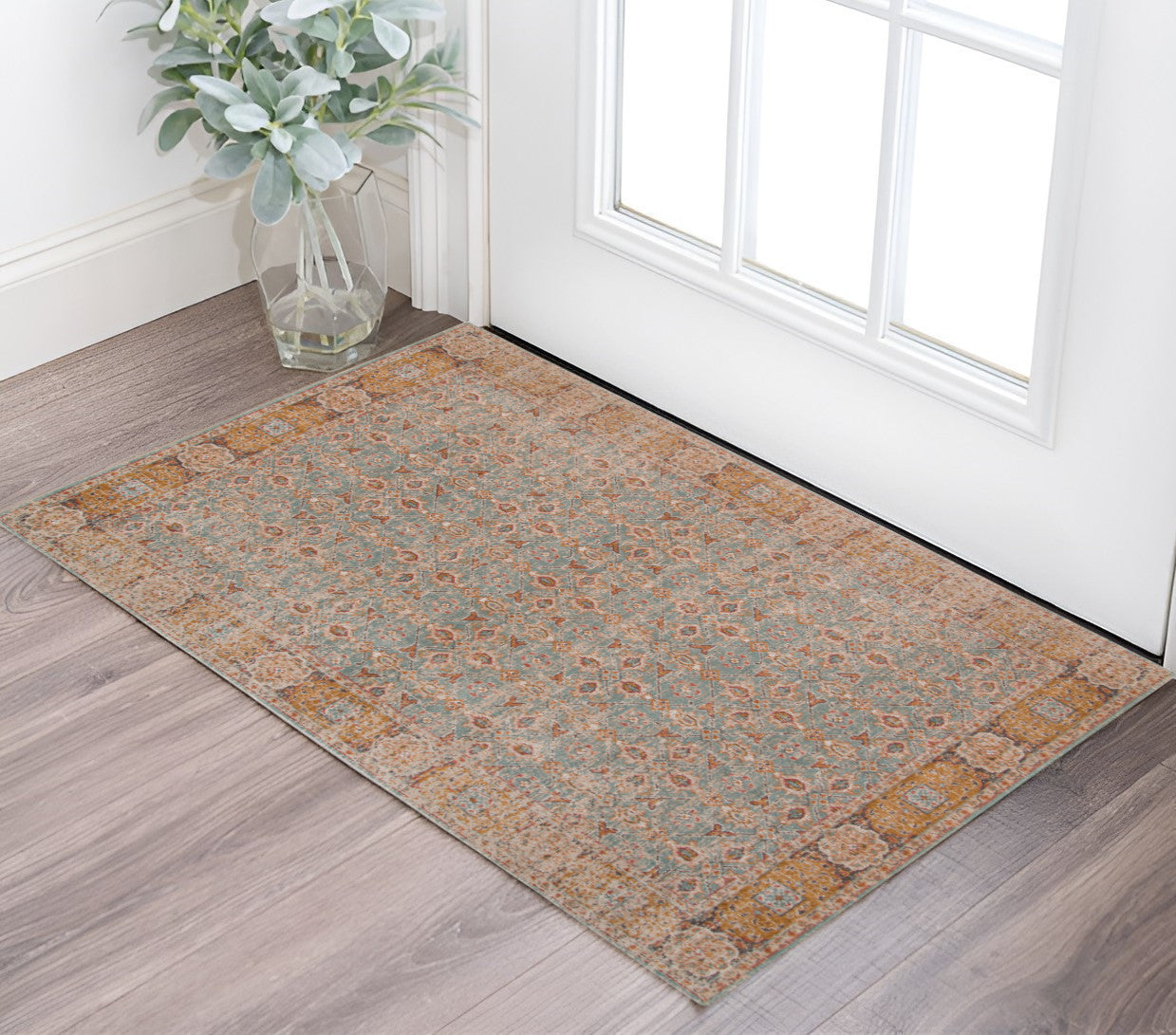 9' X 12' Teal Red And Orange Floral Area Rug