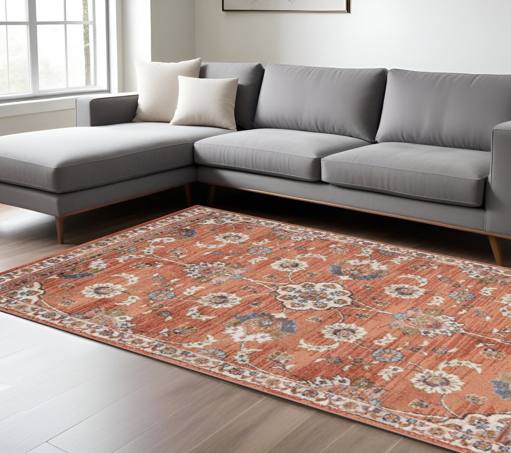 9' X 12' Ivory Blue And Orange Floral Area Rug