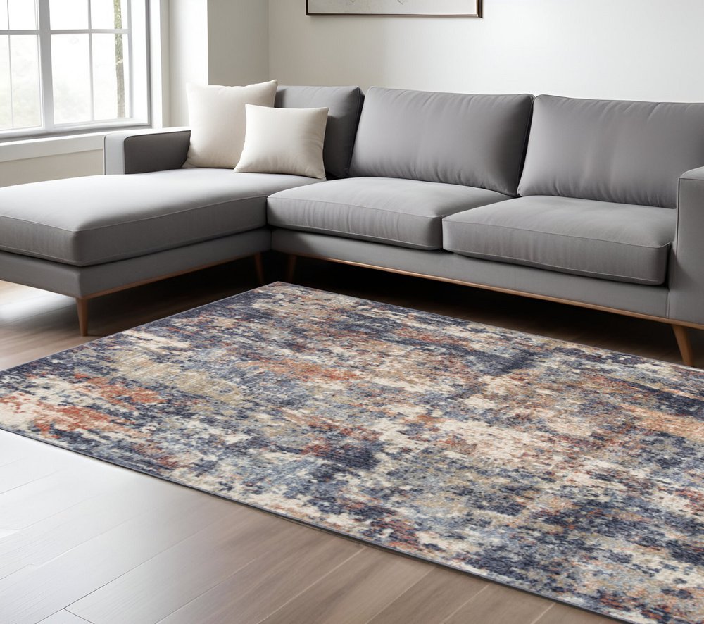 5' X 8' Ivory Orange And Dark Gray Abstract Area Rug