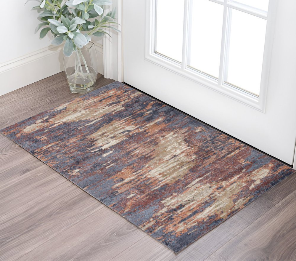 8' X 10' Ivory Rust And Blue Abstract Area Rug