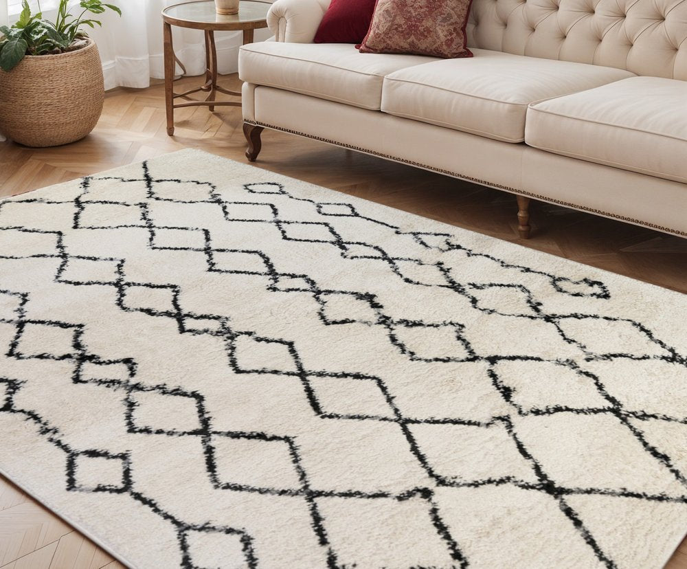 2' X 3' Ivory And Black Geometric Shag Area Rug