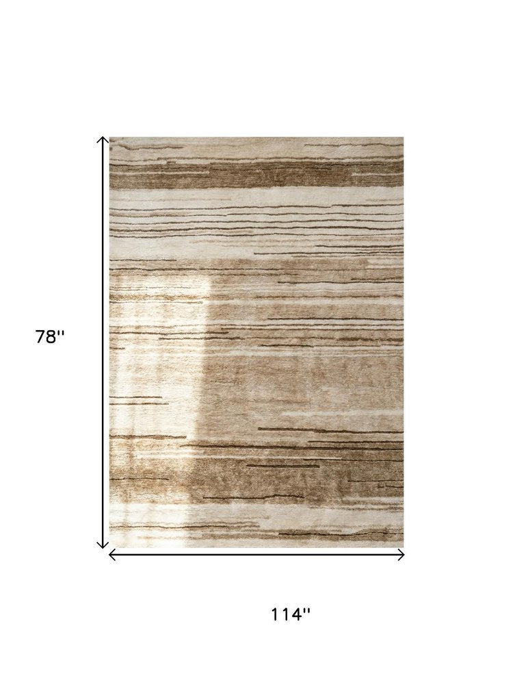 7' X 10' Beige and Brown Abstract Power Loom Distressed Non Skid Area Rug