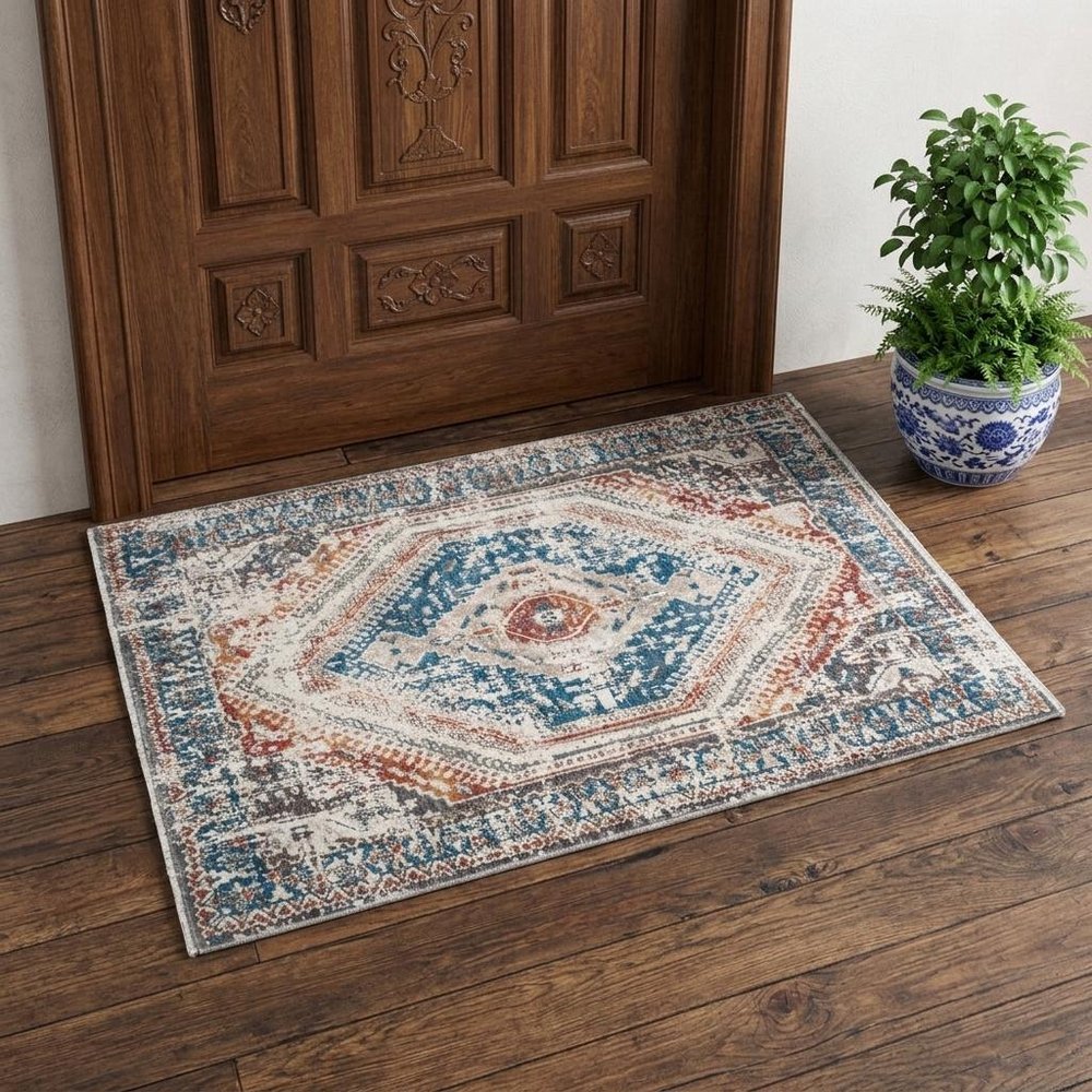 2' X 3' Teal Taupe and Rust Geometric Distressed Area Rug With Fringe