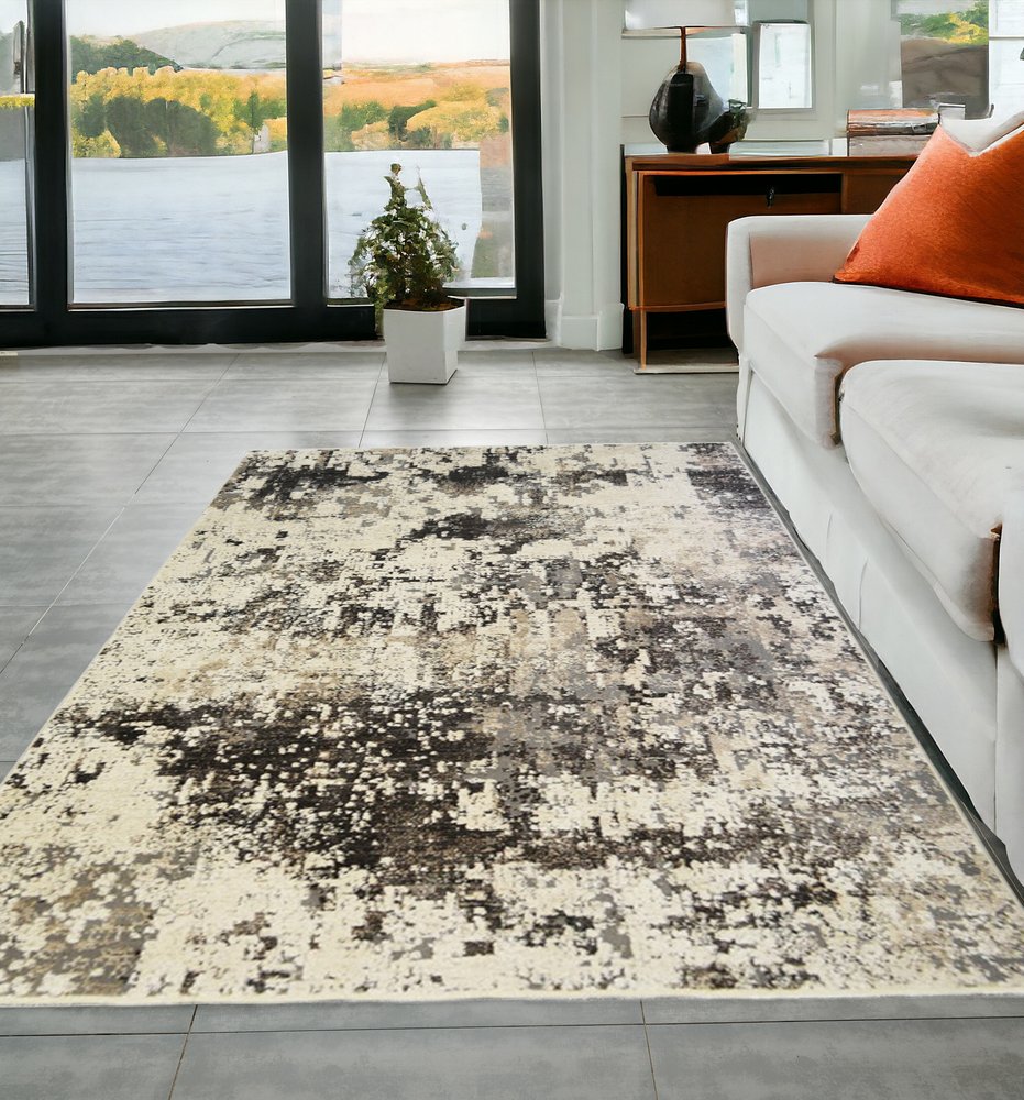 5' X 8' Black Abstract Distressed Area Rug With Fringe