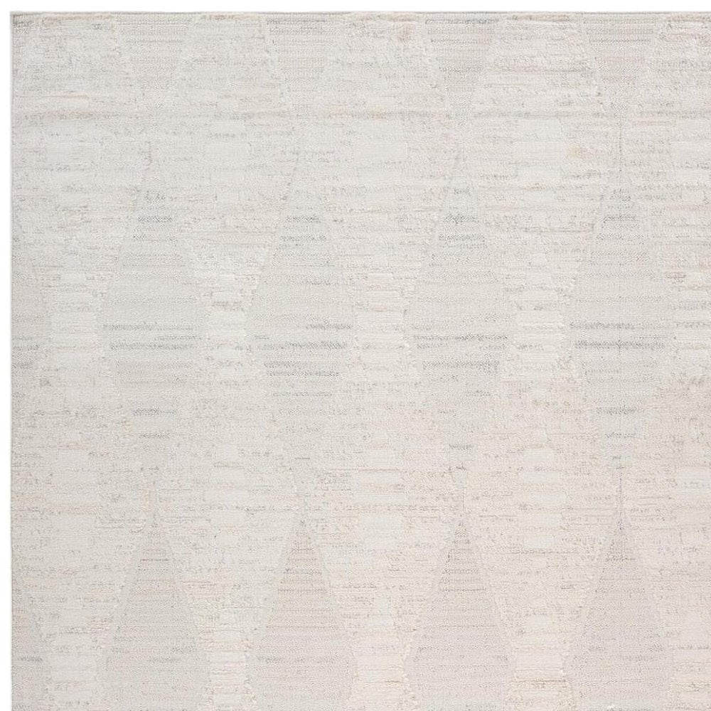 8' X 11' Cream and Beige Geometric Distressed Area Rug