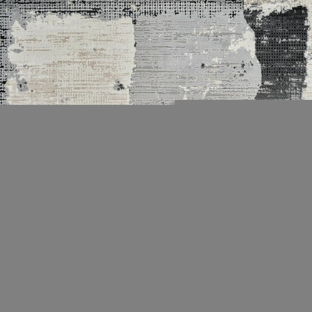 5' X 8' Beige and Black Abstract Distressed Area Rug