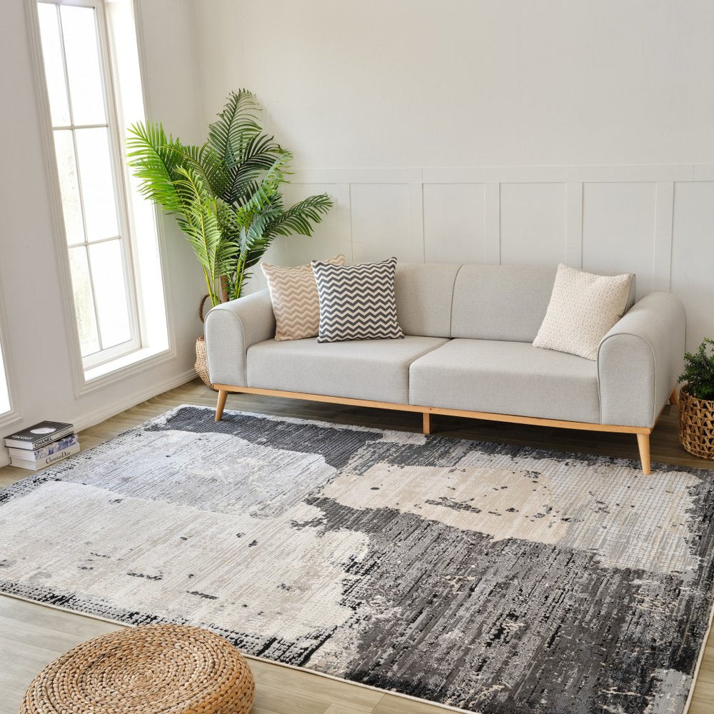 7' X 10' Beige and Black Abstract Distressed Area Rug