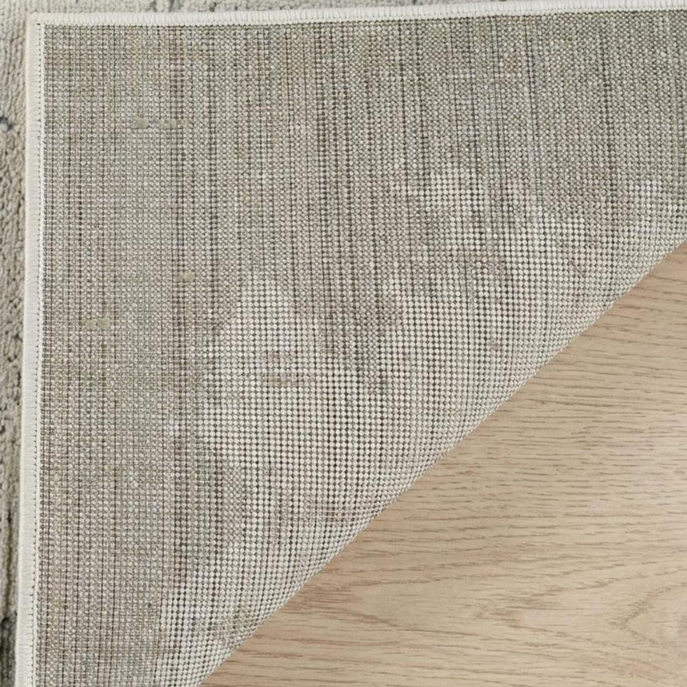 7' X 10' Beige and Green Abstract Distressed Area Rug
