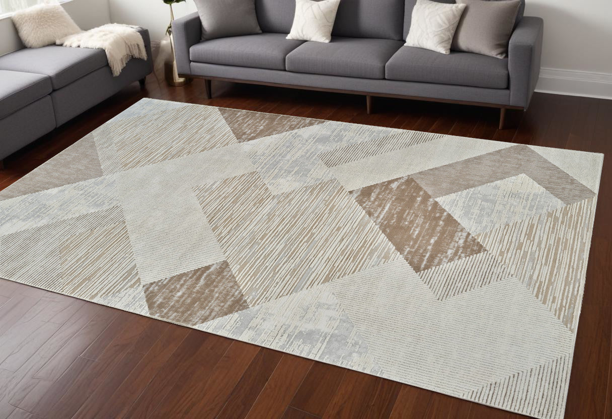 8' X 11' Beige and Brown Abstract Distressed Area Rug