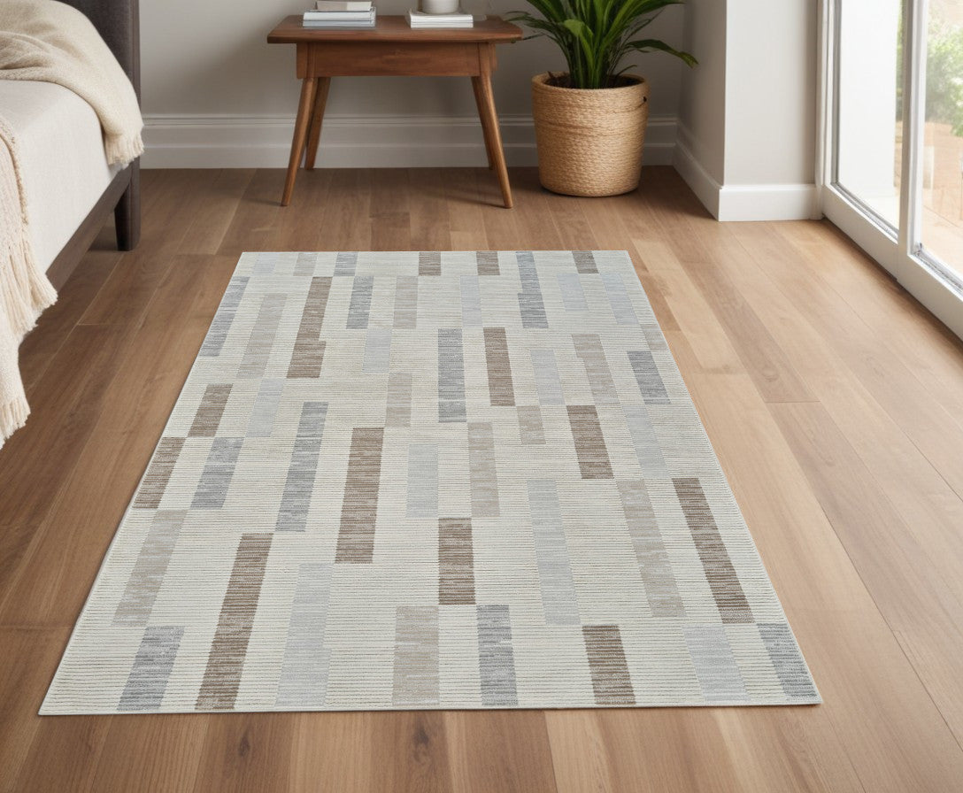 4' X 6' Beige and Brown Abstract Distressed Area Rug