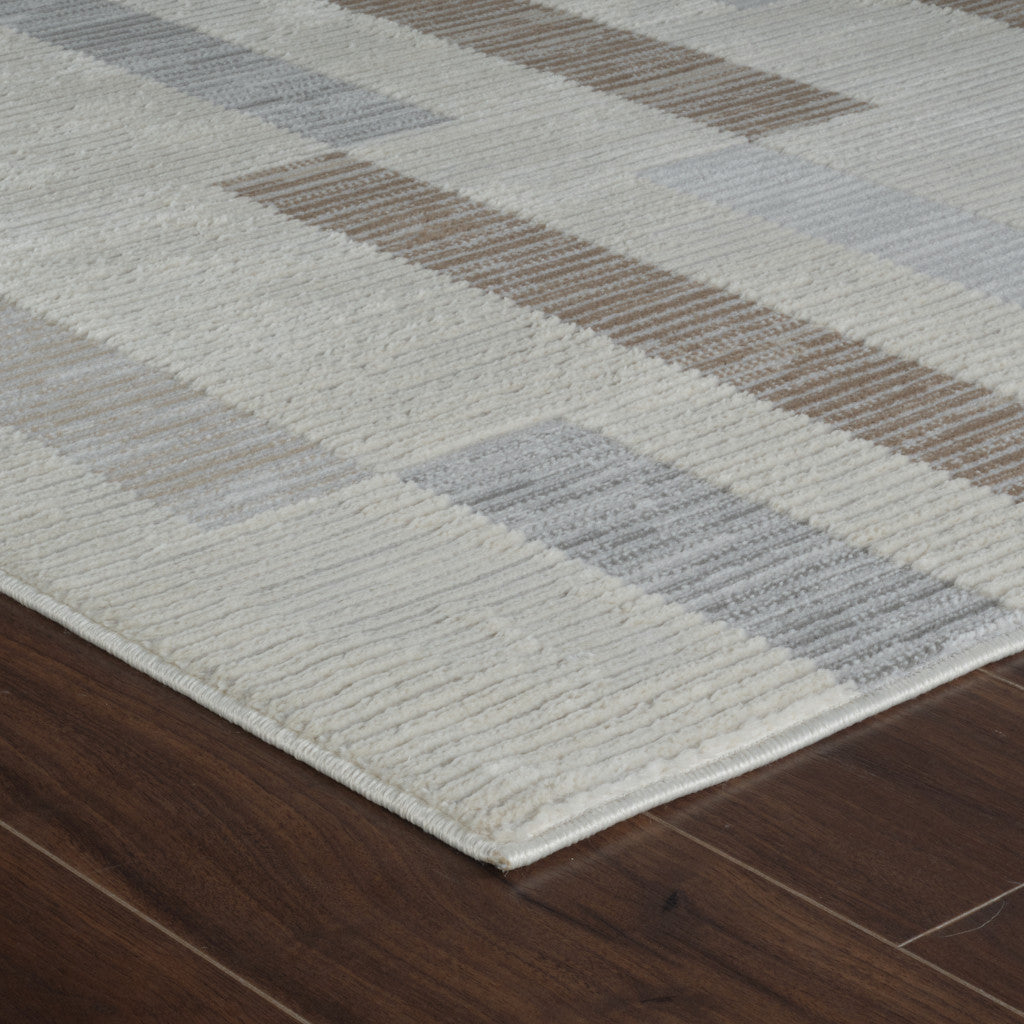 5' X 8' Beige and Brown Abstract Distressed Area Rug