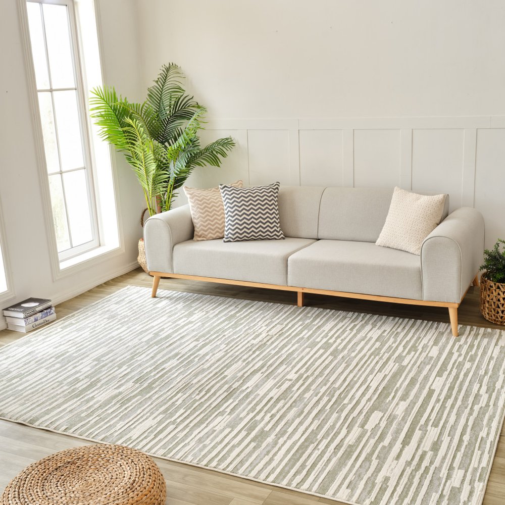 5' X 8' Beige and Green Abstract Distressed Area Rug