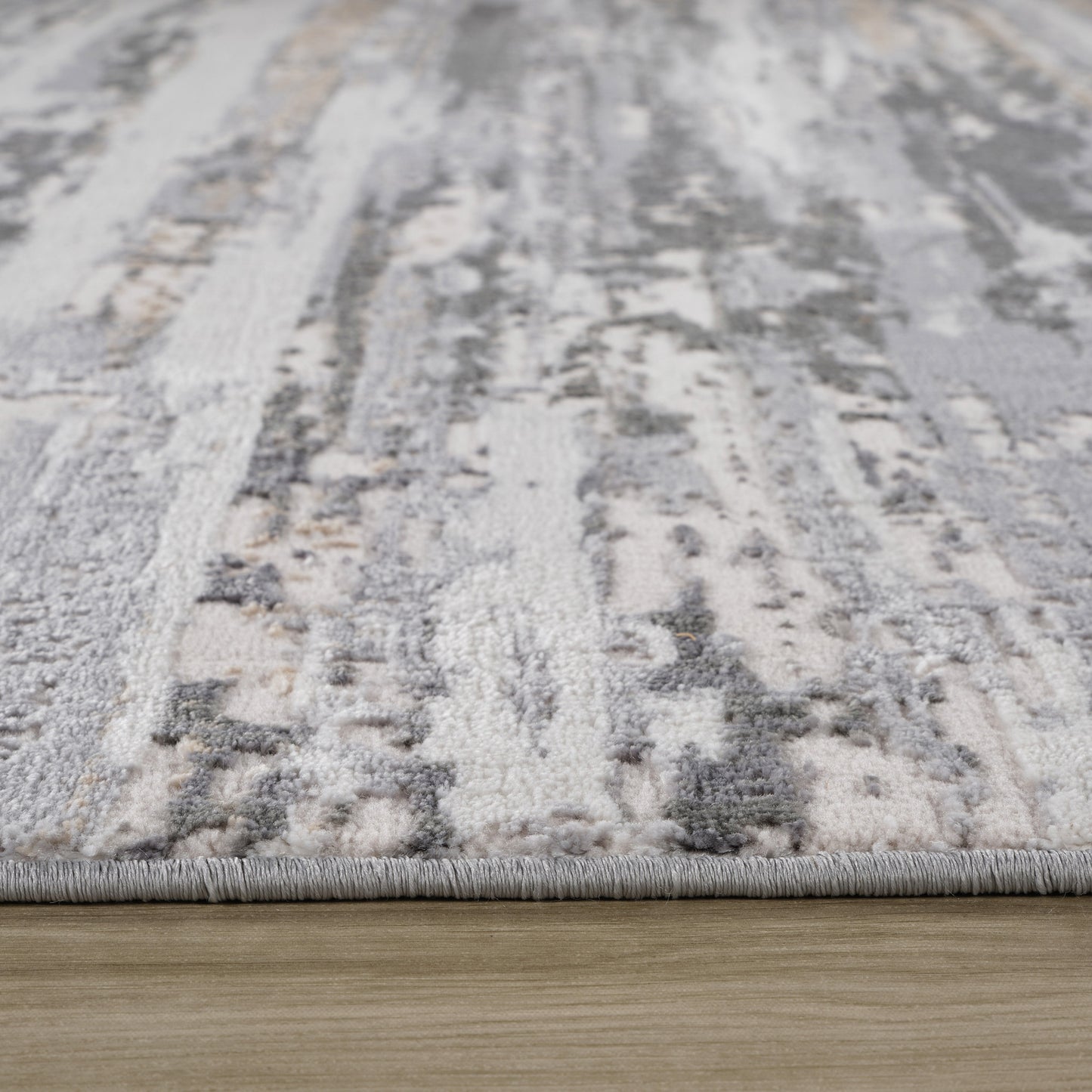 5' X 8' Beige and Gray Abstract Distressed Area Rug