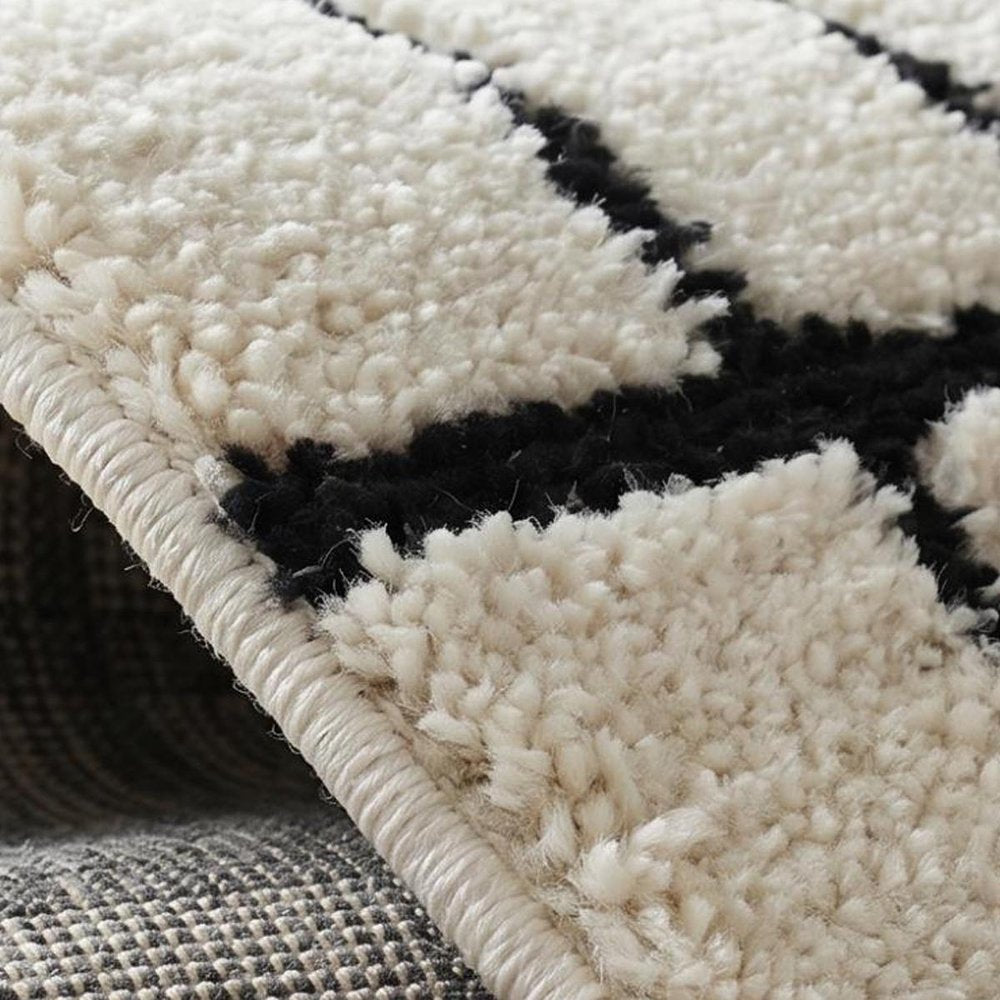 7' X 10' Cream and Black Abstract Distressed Area Rug