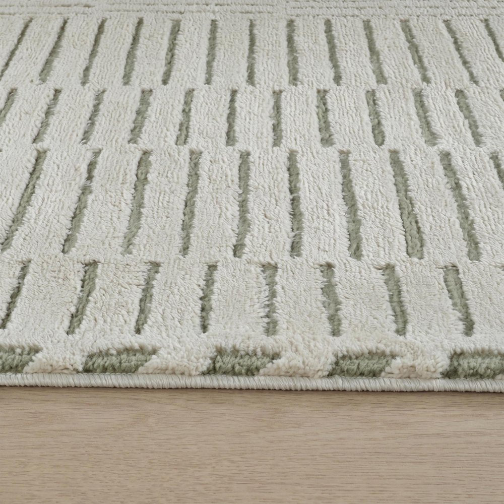 7' X 10' Cream and Green Abstract Distressed Area Rug