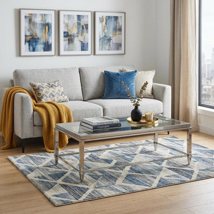 55" Clear and Silver Glass And Steel Coffee Table