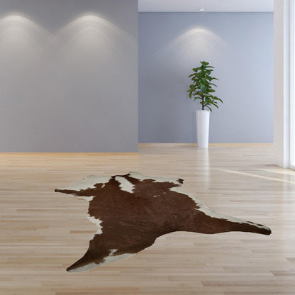 2' X 3' Brown And White Cowhide Cowhide Print Hand Tufted Area Rug