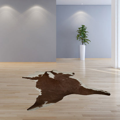 2' X 3' Brown And White Cowhide Cowhide Print Hand Tufted Area Rug