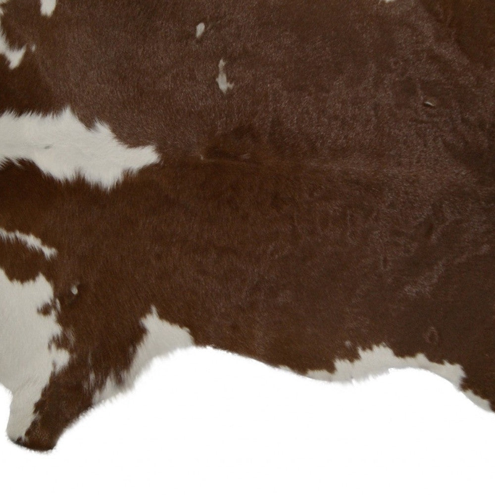 2' X 3' Brown and White Cowhide Hand Woven Area Rug