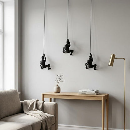 Set of Three Black Resin Climbing Man Hanging Dimensional Sculpture