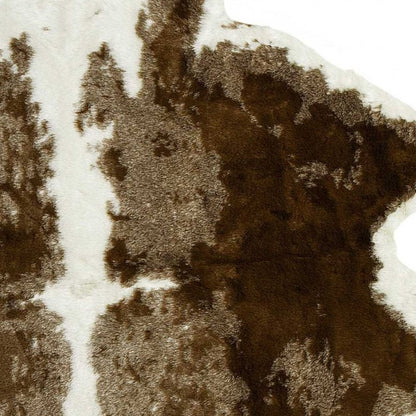 4' X 5' Brown And White Cowhide Print Hand Knotted Area Rug