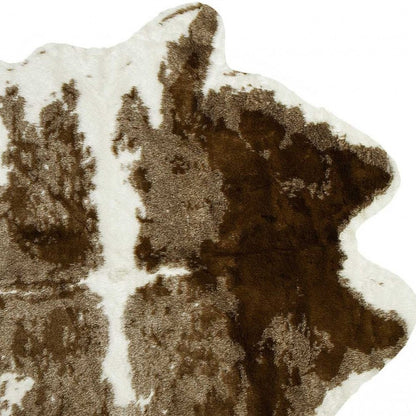 4' X 5' Brown And White Faux Fur Animal Print Washable Area Rug