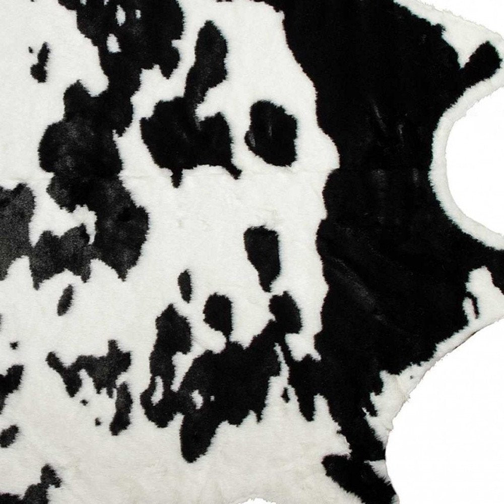 4' X 5' Brown And White Faux Fur Animal Print Washable Area Rug