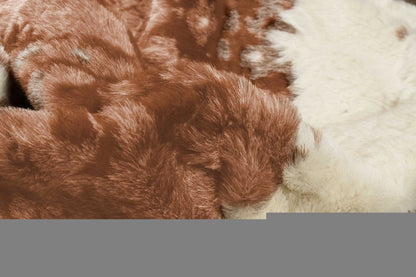 4' X 5' Brown And Ivory Faux Cowhide Animal Print Area Rug