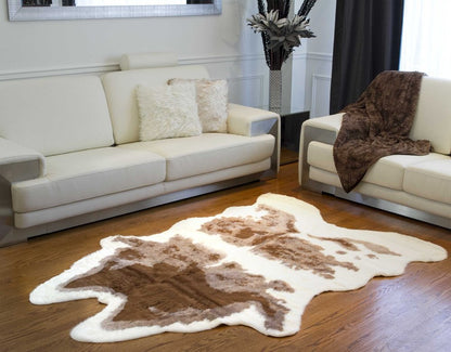 4' X 5' Brown And Ivory Faux Cowhide Animal Print Area Rug