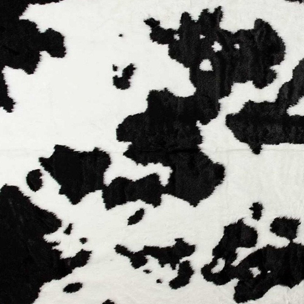 5' X 8' Black And White Cowhide Print Washable Area Rug