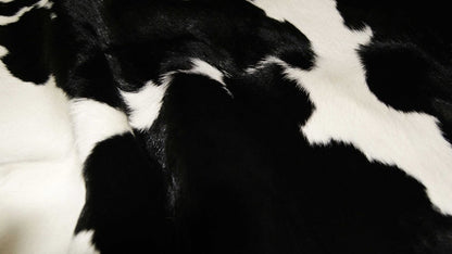 2' X 3' Black And White Cowhide Abstract Hand Woven Area Rug
