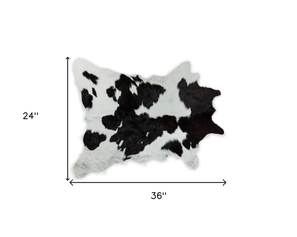 2' X 3' Black And White Cowhide Abstract Hand Woven Area Rug