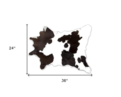 2' X 3' Black And White Cowhide Abstract Hand Woven Area Rug