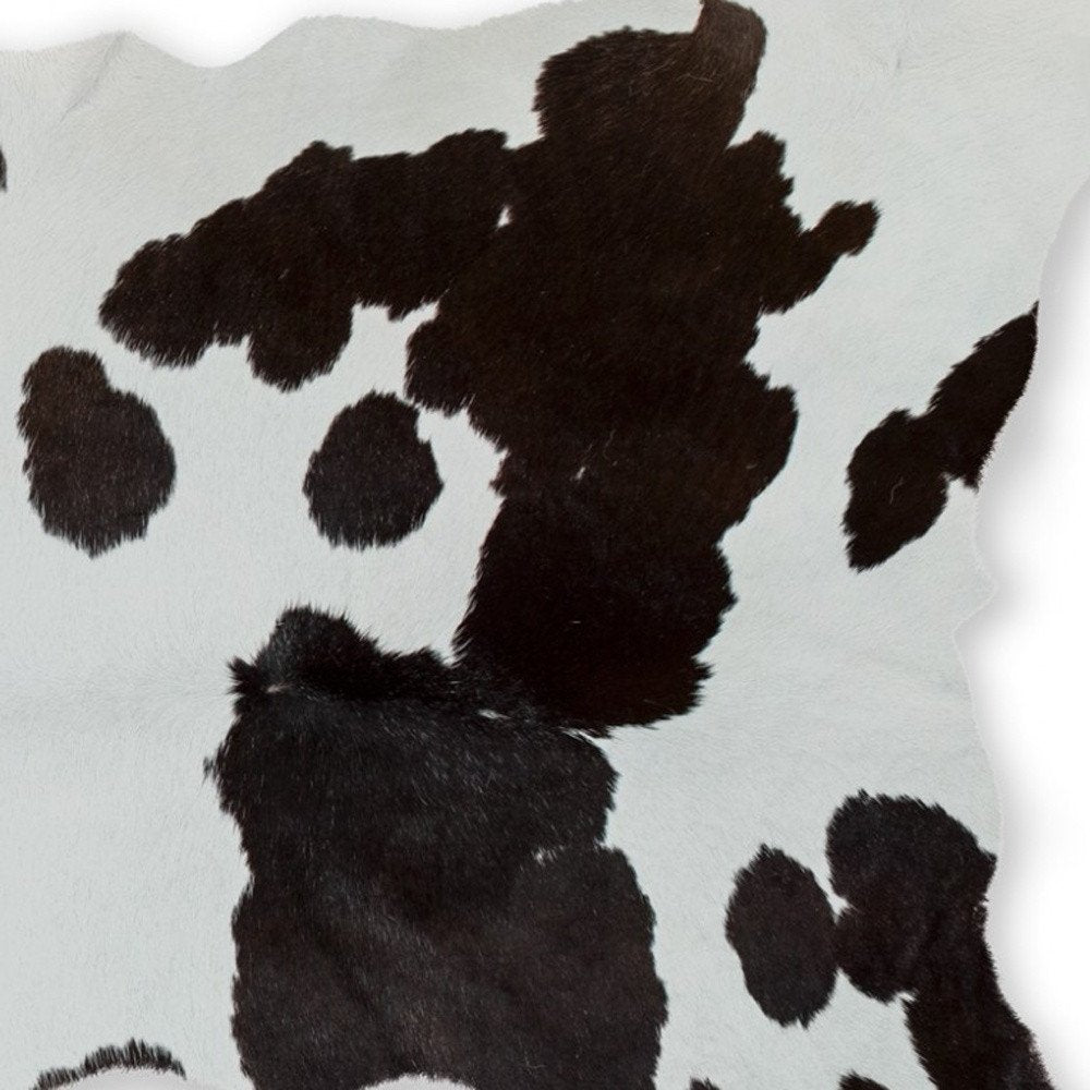 2' X 3' Black And White Cowhide Abstract Hand Woven Area Rug