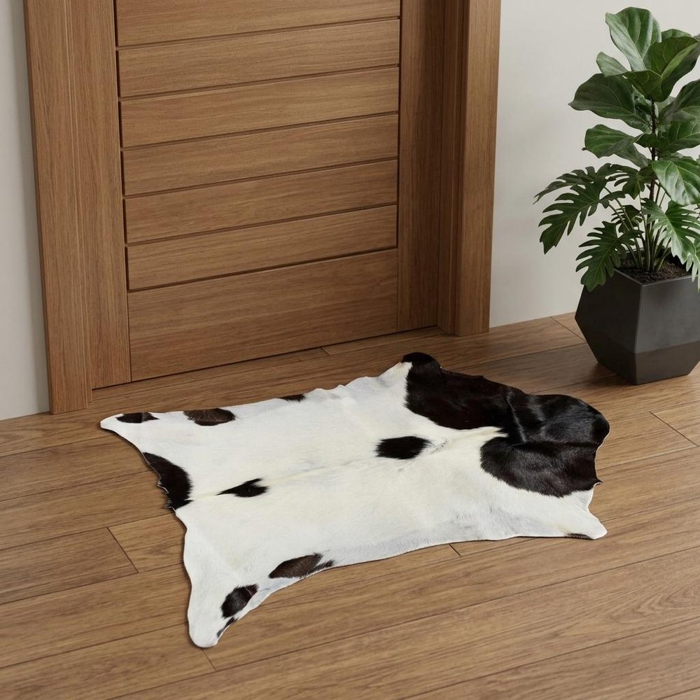 2' X 3' Black And White Cowhide Cowhide Print Hand Woven Area Rug