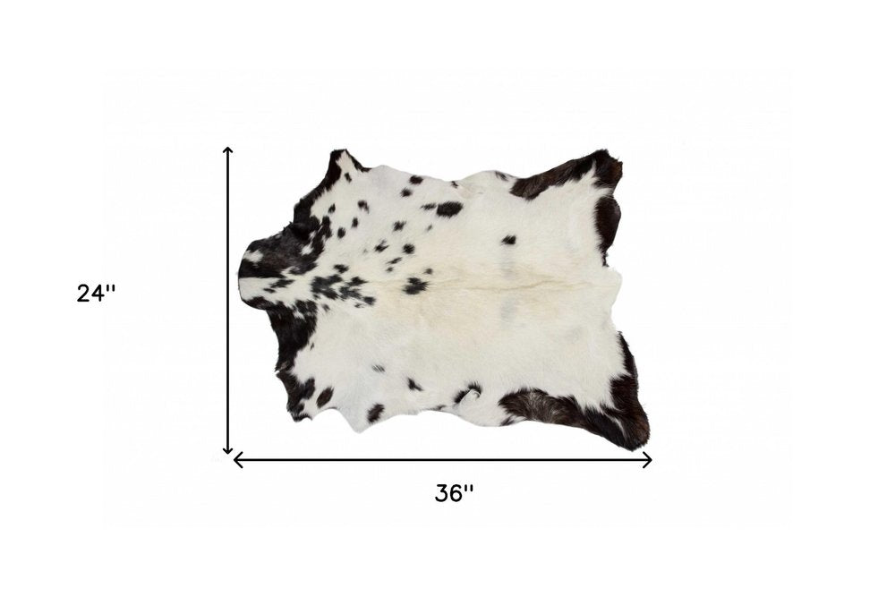 2' X 3' Black And White Cowhide Cowhide Print Hand Woven Area Rug