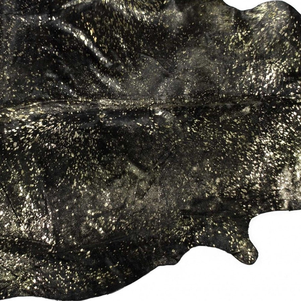 5' X 7' Black And Gold Cowhide Cowhide Print Area Rug
