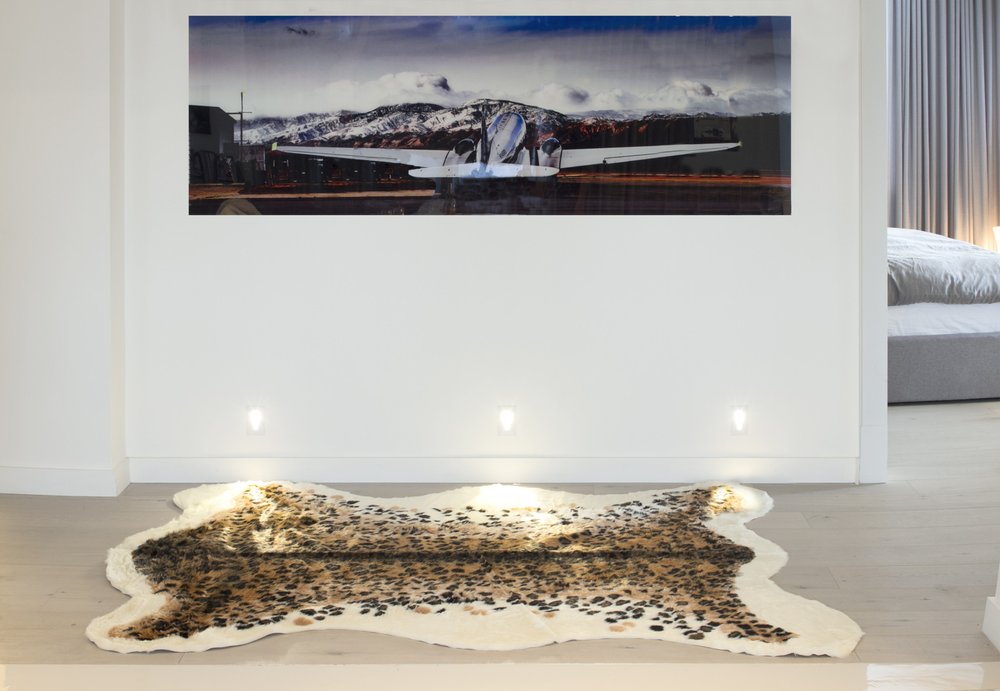 5' X 8' Brown And Black Leopard Print Hand Knotted Area Rug