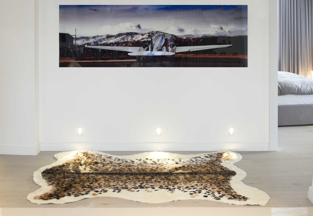 5' X 8' Brown And Black Leopard Print Hand Knotted Area Rug