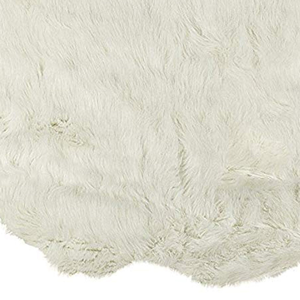 2' X 6' Off White Faux Sheepskin Machine Tufted Non Skid Area Rug