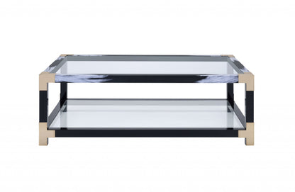 54" Clear And Black and White Glass And Metal Coffee Table With Shelf