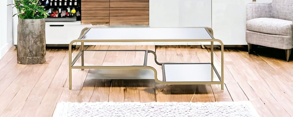 52" Clear and Gold Mirrored Glass And Iron Coffee Table With Shelf