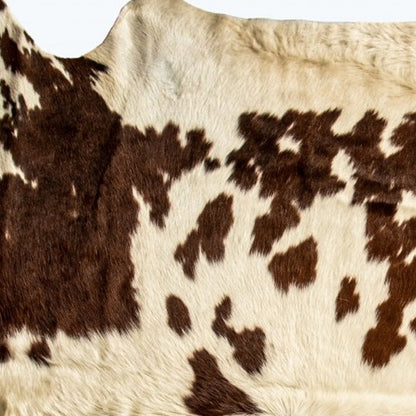 6' X 7' Brown And White Cowhide Cowhide Print Area Rug