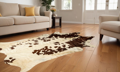 6' X 7' Brown and White Cowhide Handmade Area Rug