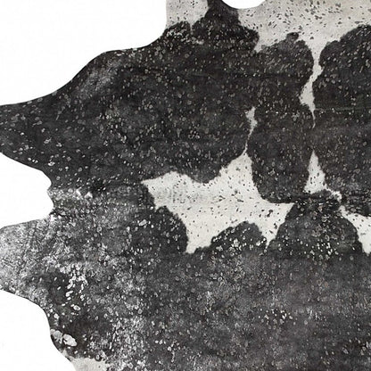 6' X 7' Black And Silver Cowhide Cowhide Print Area Rug