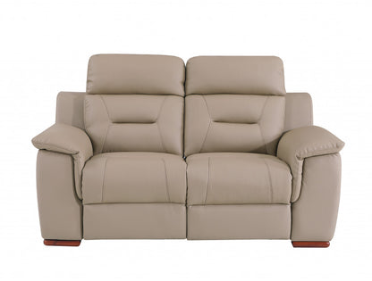 67" Beige And Brown Faux Leather Manual Reclining Loveseat